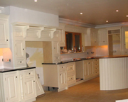 Bespoke kitchen with granite tops and curved island unit